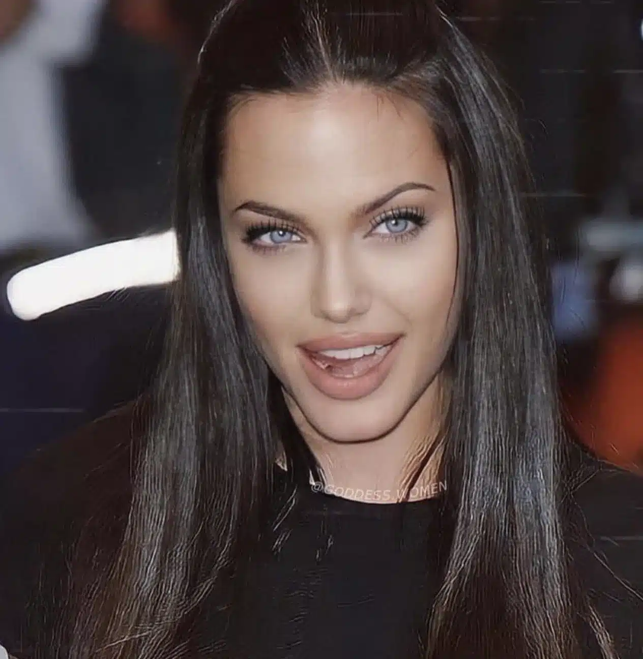 “Angelina Jolie close-up featuring balanced gingival display and warm enamel shade.”