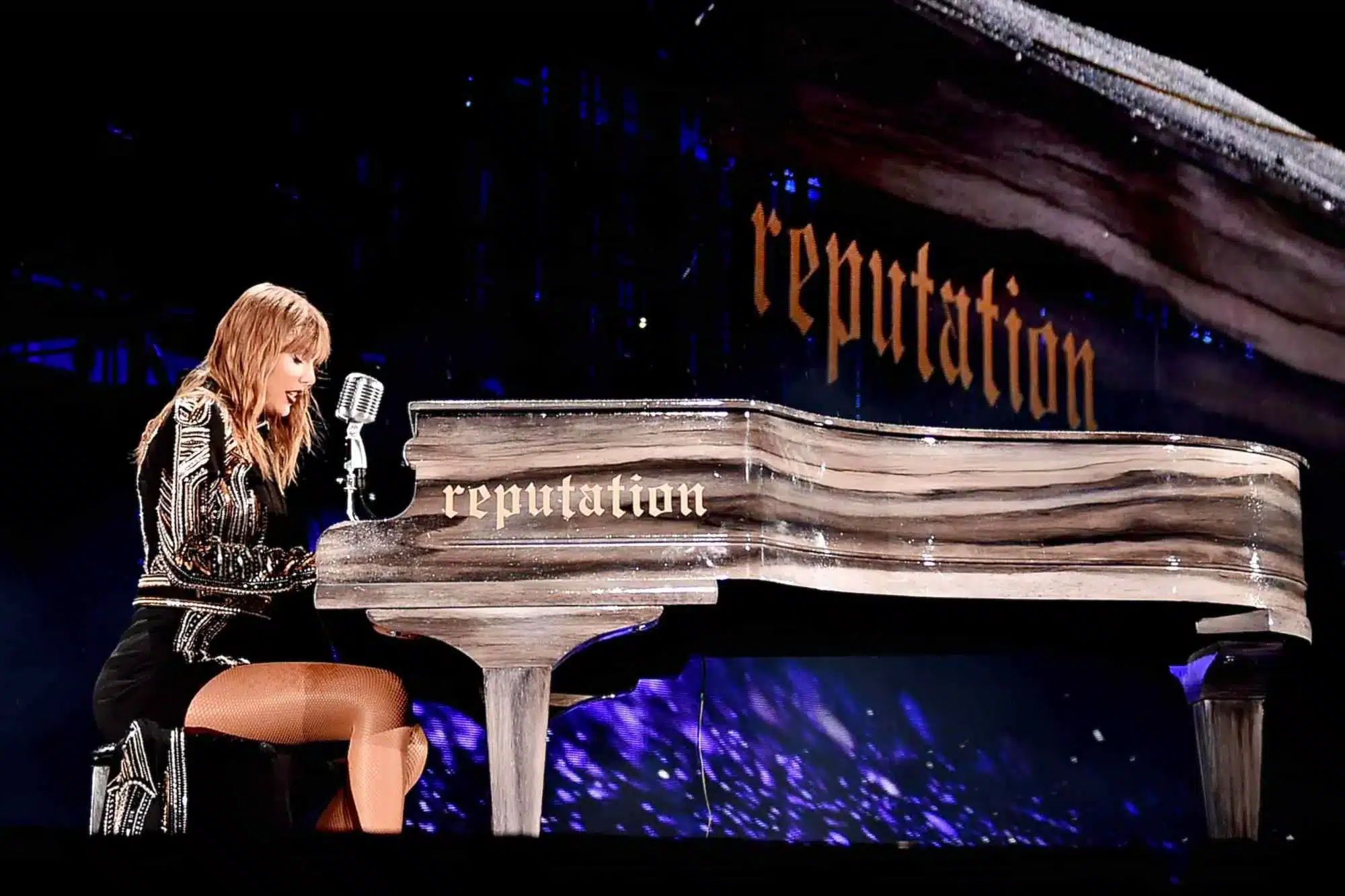 10. “High-resolution close-up of Taylor Swift’s smile under LED lighting.”