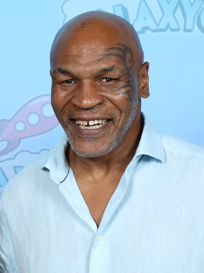Mike Tyson's Teeth: The Famous Gold Tooth, the Gap, and the Modern Options