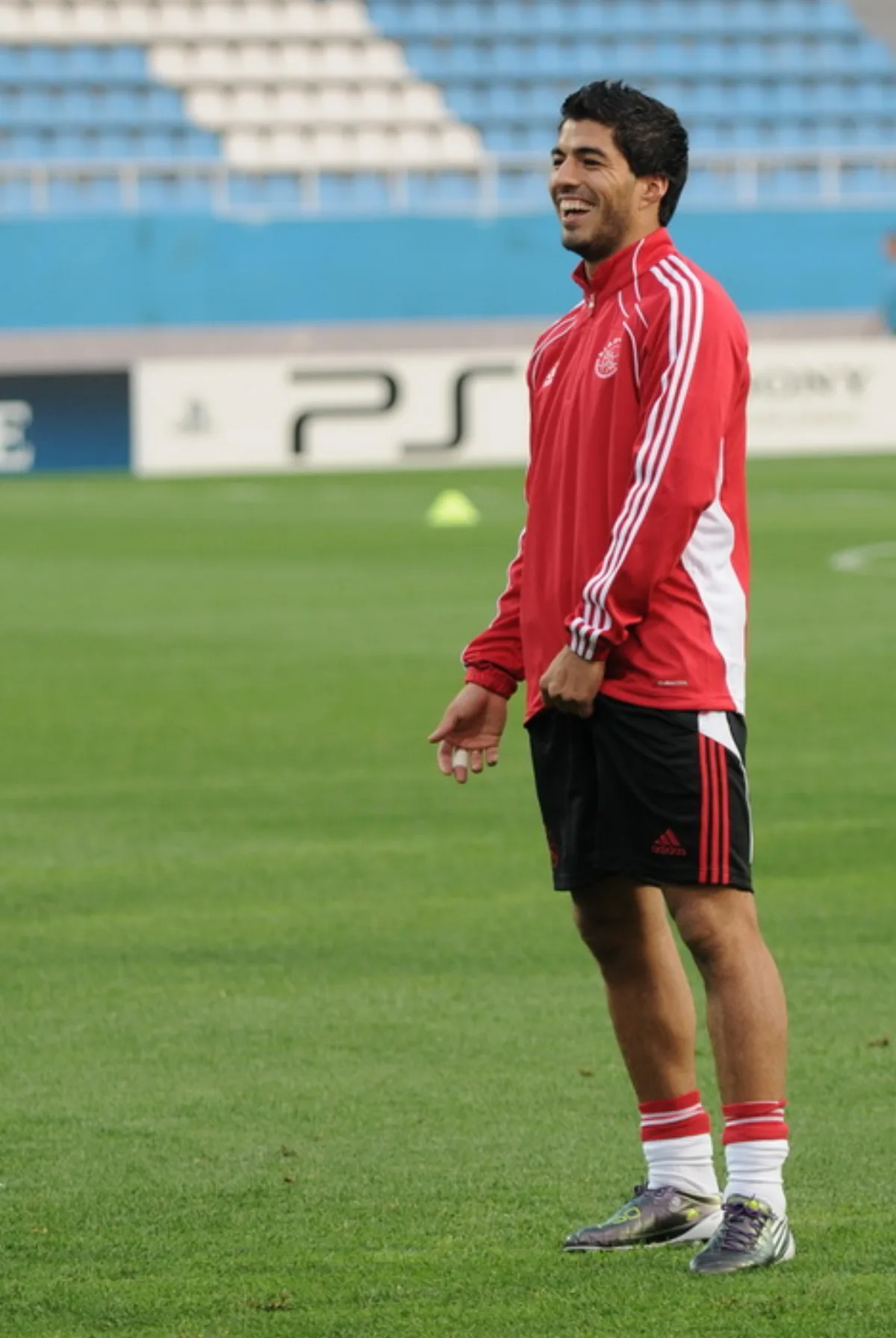 Luis Suárez laughing in 2010, playing for Ajax