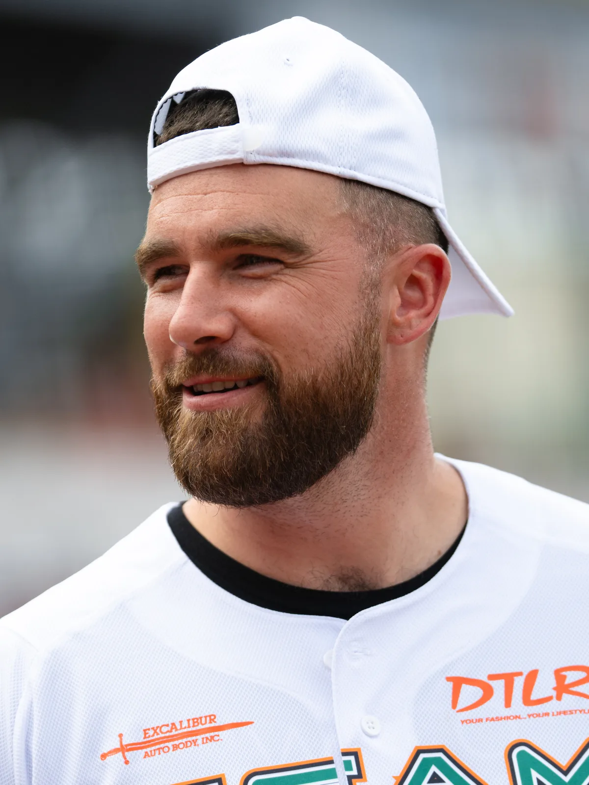 Travis Kelce in 2024, at a charity softball game