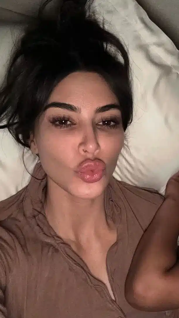 30. Kim Kardashian smile geometry presented in a clean portrait composition