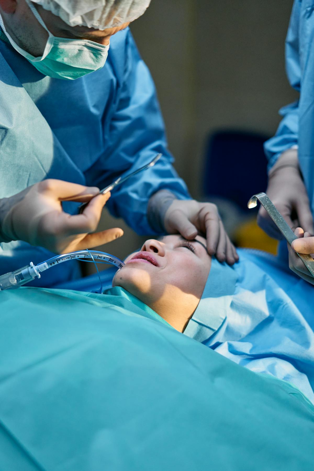 Doctor explaining rhinoplasty procedure details to patient in clinical consultation