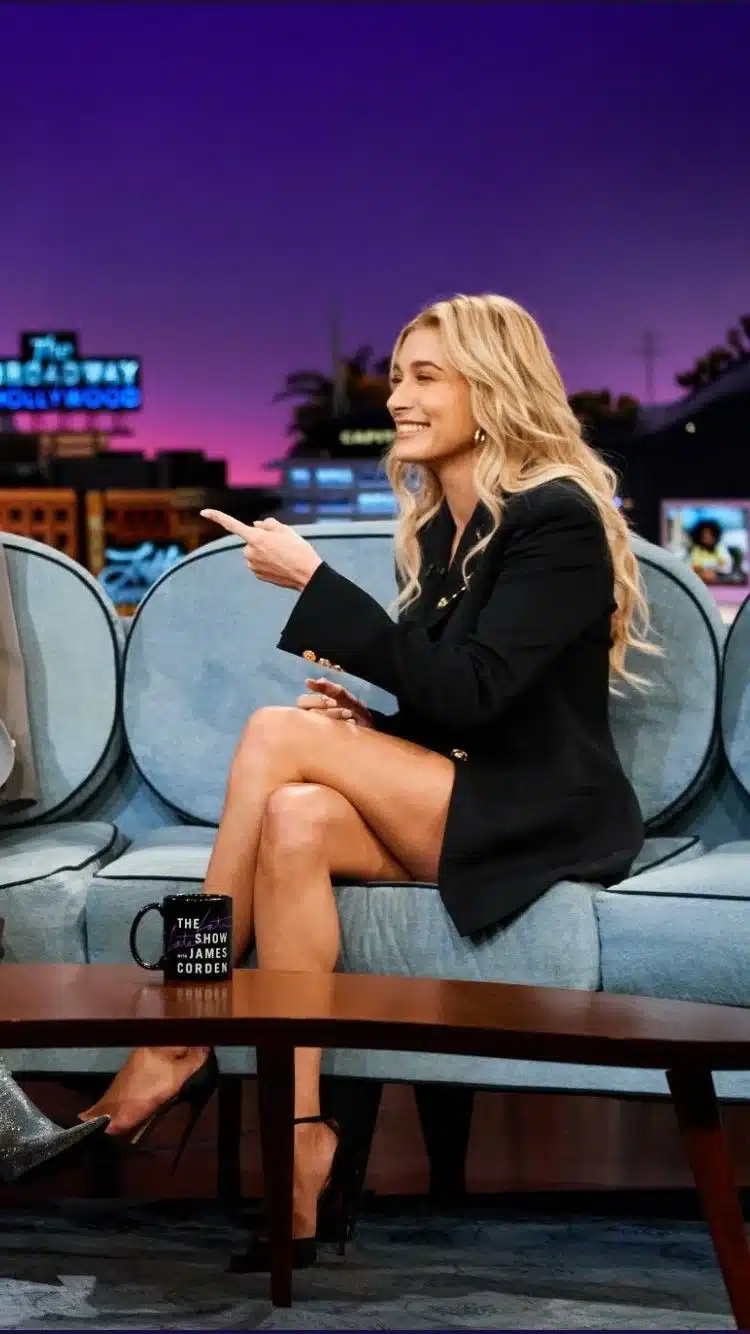 14. “Hailey Bieber with defined cheekbones and smooth complexion.”