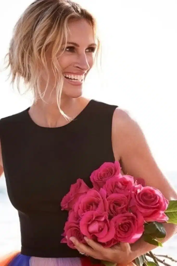 “Julia Roberts with positive smile arc and natural incisor visibility.”