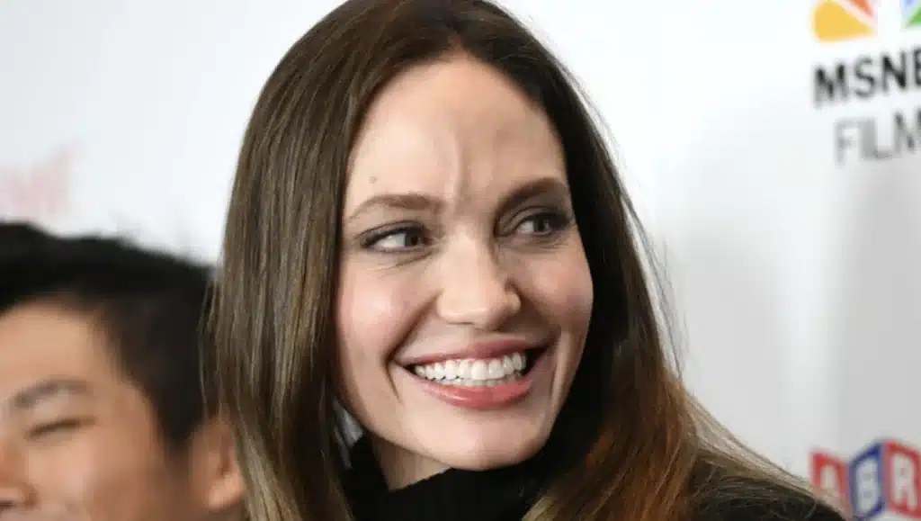 Angelina Jolie Smile Harmony 41 “Artistic portrait of Angelina Jolie highlighting harmony between lips and teeth.”